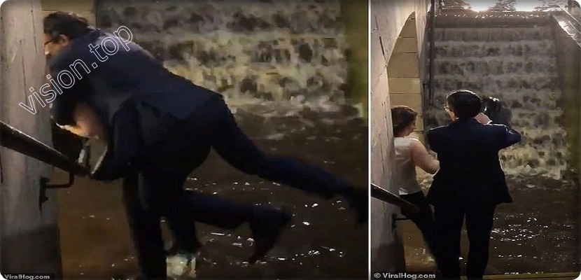 فيديو لإمرأة أمريكية تحمل رجلاً  في المطر يثير التساؤل