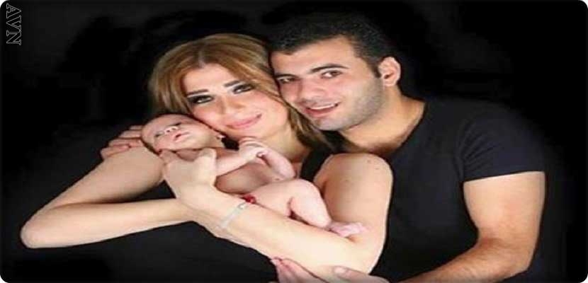 نجم كرة القدم المصري عماد متعب وزوجته